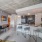 living room with large open spaces and excellent lighting from large window/patio doors