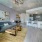 spacious living room with easy access to dining area and on wood-style flooring
