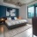 bedroom with ample space for moving around the bed and entering other rooms