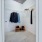 closet area with multiple shelves