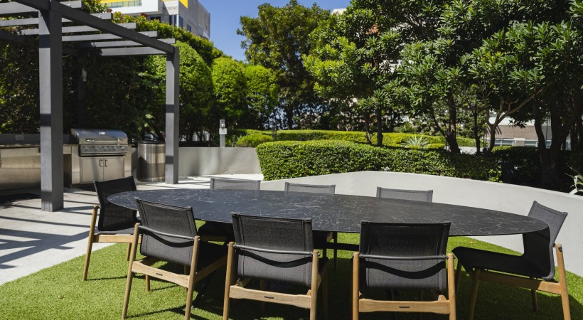 al-fresco dining a table and chairs outside